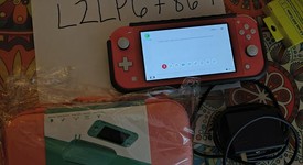 Mint
													Nintendo Switch Lite - Coral, photo 2 of 15