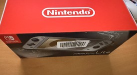 New
													Nintendo Switch Lite - Gray, Dialga & Palkia Edition, photo 3 of 15