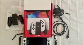 Mint
													Nintendo Switch - OLED - White, 64 GB, photo 1 of 10