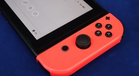 Fair
													Nintendo Switch - Red & Blue, 32 GB, photo 4 of 9