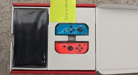 New
													Nintendo Switch - OLED - Red & Blue, 64 GB, photo 1 of 3