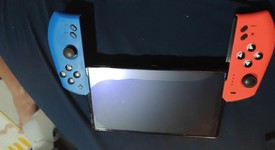 Good
													Nintendo Switch - OLED - Red & Blue, 64 GB, photo 1 of 5