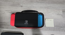 Good
													Nintendo Switch - OLED - Black, 64 GB, Super Smash Bros., photo 4 of 11