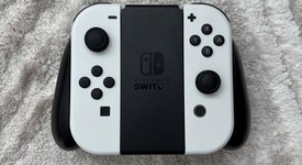 Mint
													Nintendo Switch - OLED - White, 64 GB, photo 5 of 15