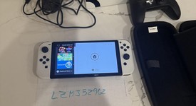 Mint
													Nintendo Switch - OLED - White, 64 GB, The Legend of Zelda: Tears of the Kingdom Edition, photo 2 of 6