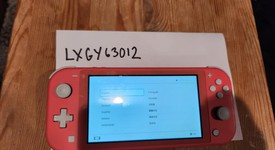Good
													Nintendo Switch Lite - Coral, photo 1 of 3