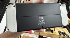 Mint
													Nintendo Switch - OLED - White, 64 GB, photo 4 of 14