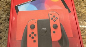 New
													Nintendo Switch - OLED - Red & Blue, 64 GB, photo 1 of 3