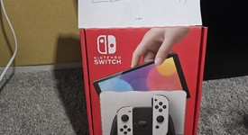 New
													Nintendo Switch - OLED - White, 64 GB, photo 1 of 4