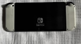 Mint
													Nintendo Switch - OLED - White, 64 GB, photo 5 of 12