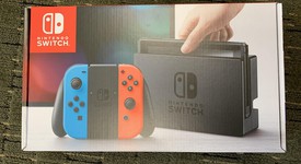 New
													Nintendo Switch - Red & Blue, 32 GB, photo 2 of 3