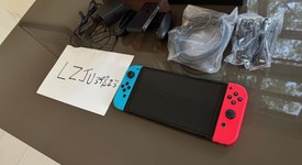 Mint
													Nintendo Switch - OLED - Red & Blue, 64 GB, photo 3 of 8