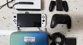 Mint
													Nintendo Switch - OLED - White, 64 GB, photo 2 of 15