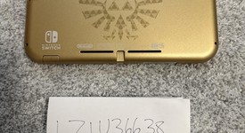 Mint
													Nintendo Switch Lite - Gold, Hyrule Edition, photo 5 of 9