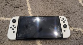 Mint
													Nintendo Switch - OLED - White, 64 GB, photo 2 of 12