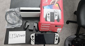 Mint
													Nintendo Switch - OLED - White, 64 GB, photo 1 of 8