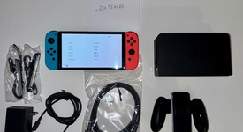 Mint
													Nintendo Switch - OLED - Red & Blue, 64 GB, photo 1 of 10