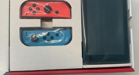New
													Nintendo Switch - Red & Blue, 32 GB, photo 5 of 31