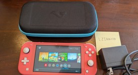 Mint
													Nintendo Switch Lite - Coral, photo 1 of 8