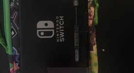 Good
													Nintendo Switch - Pink & Green, 32 GB, photo 1 of 13