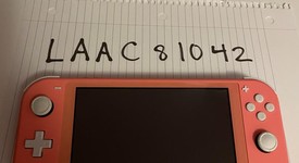 Mint
													Nintendo Switch Lite - Coral, photo 1 of 12