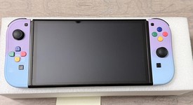 Mint
													Nintendo Switch - OLED - White, 64 GB, photo 2 of 9