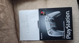 New
													DualSense Wireless Controller - Gray, 30th Anniversary Limited Edition, photo 1 of 2