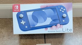New
													Nintendo Switch Lite - Blue, photo 1 of 5