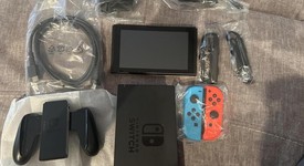 Mint
													Nintendo Switch - Red & Blue, 32 GB, photo 1 of 9