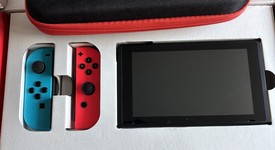Mint
													Nintendo Switch - Red & Blue, 32 GB, photo 1 of 12
