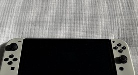 Mint
													Nintendo Switch - OLED - White, 64 GB, photo 4 of 12