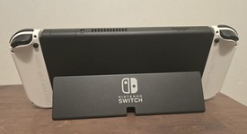 Mint
													Nintendo Switch - OLED - White, 64 GB, photo 4 of 13