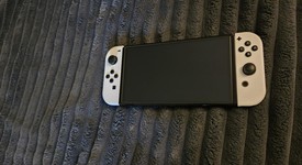 Mint
													Nintendo Switch - OLED - White, 64 GB, photo 3 of 7
