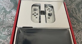 New
													Nintendo Switch - OLED - White, 64 GB, photo 3 of 5