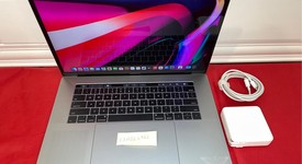 Good
													MacBook Pro 2017 (With Touch Bar) - 15" - I7, Gray, 256 GB, 16 GB, photo 2 of 9