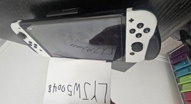 Mint
													Nintendo Switch - OLED - White, 64 GB, photo 4 of 8