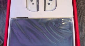 New
													Nintendo Switch - OLED - White, 64 GB, photo 4 of 7