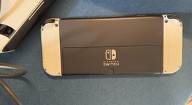 Mint
													Nintendo Switch - OLED - White, 64 GB, photo 5 of 11