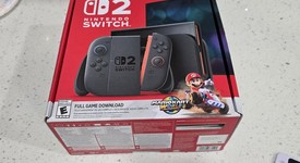 New
													Nintendo Switch 2 - Red & Blue, Standard, photo 2 of 5