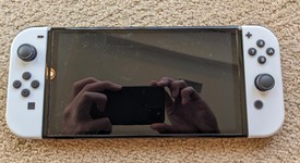 Mint
													Nintendo Switch - OLED - White, 64 GB, photo 3 of 13