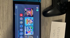 Mint
													Nintendo Switch - OLED - Red & Blue, 64 GB, photo 2 of 8