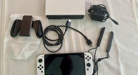 Mint
													Nintendo Switch - OLED - White, 64 GB, photo 3 of 10