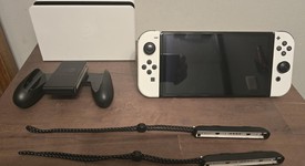 Mint
													Nintendo Switch - OLED - White, 64 GB, photo 2 of 13