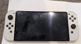 Mint
													Nintendo Switch - OLED - White, 64 GB, photo 4 of 12