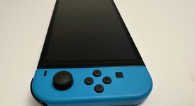 Mint
													Nintendo Switch - OLED - Red & Blue, 64 GB, photo 4 of 10