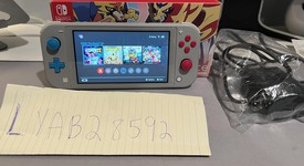 Good
													Nintendo Switch Lite - Gray, Zacian and Zamazenta Edition, photo 1 of 11