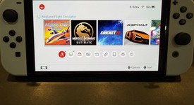 Mint
													Nintendo Switch - OLED - White, 64 GB, photo 4 of 16