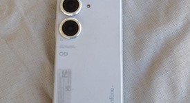 Good
													Asus Zenfone 9 - Unlocked, Silver, 128 GB, 8 GB, U.S., photo 5 of 9