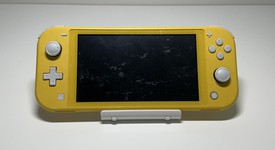 Fair
													Nintendo Switch Lite - Yellow, photo 2 of 7