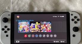 Good
													Nintendo Switch - OLED - White, 64 GB, photo 1 of 4